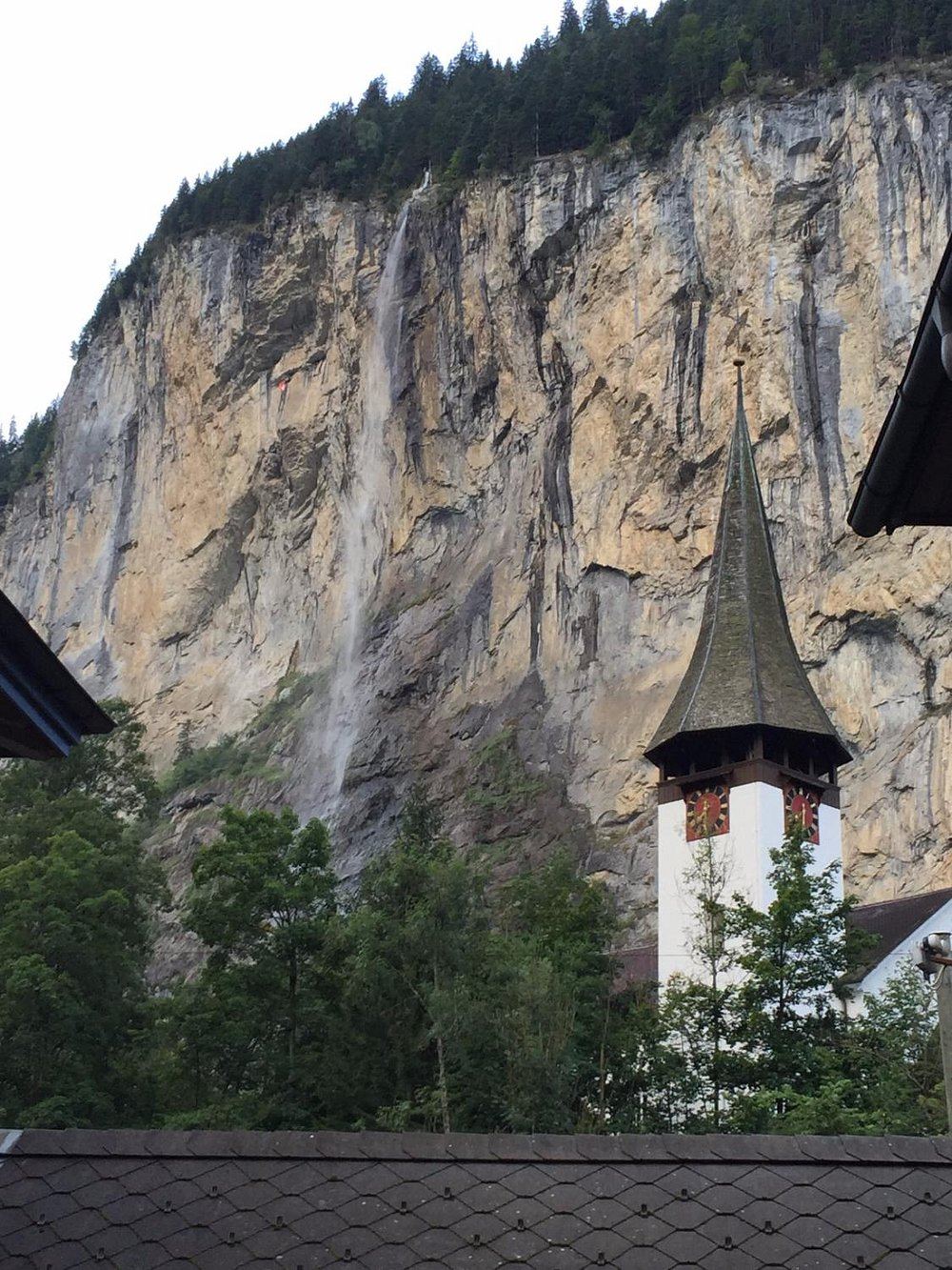 Village church and waterfall